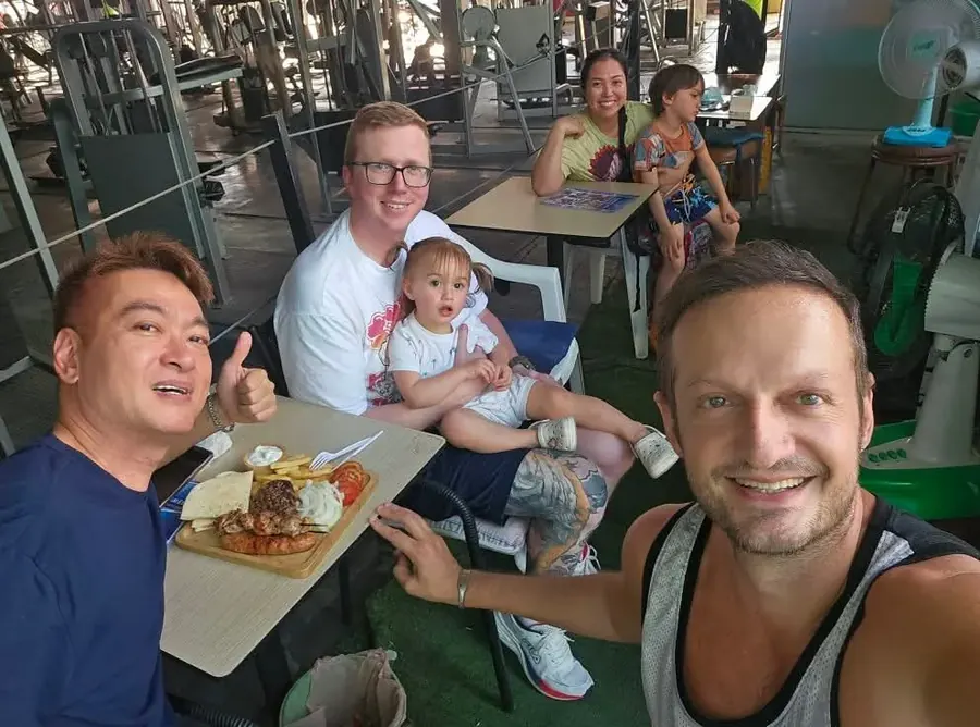 A family eating at Olympian Greek Souvlaki in Pattaya