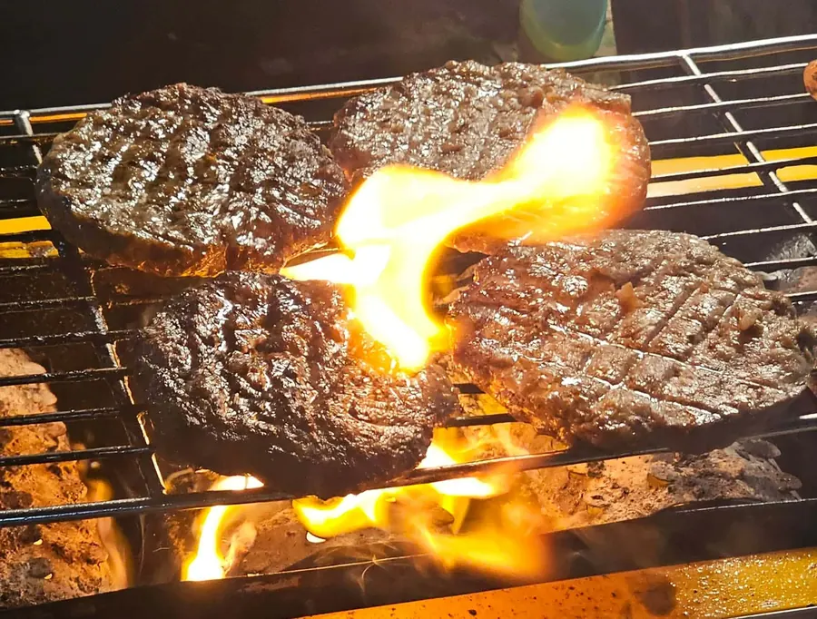 Grilled beef patties with char marks