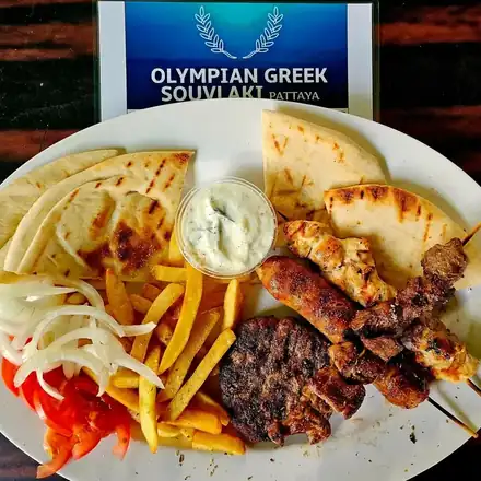 A souvlaki plate with fries