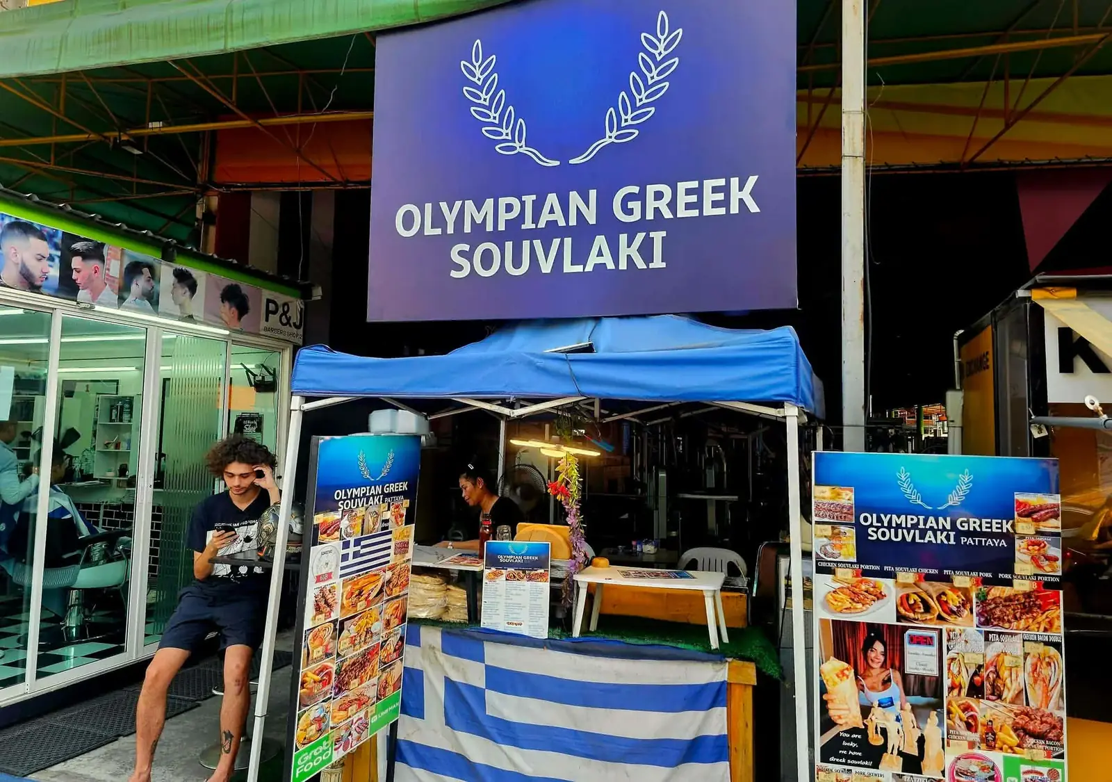The Olympian Greek Souvlaki booth lit at night in South Pattaya